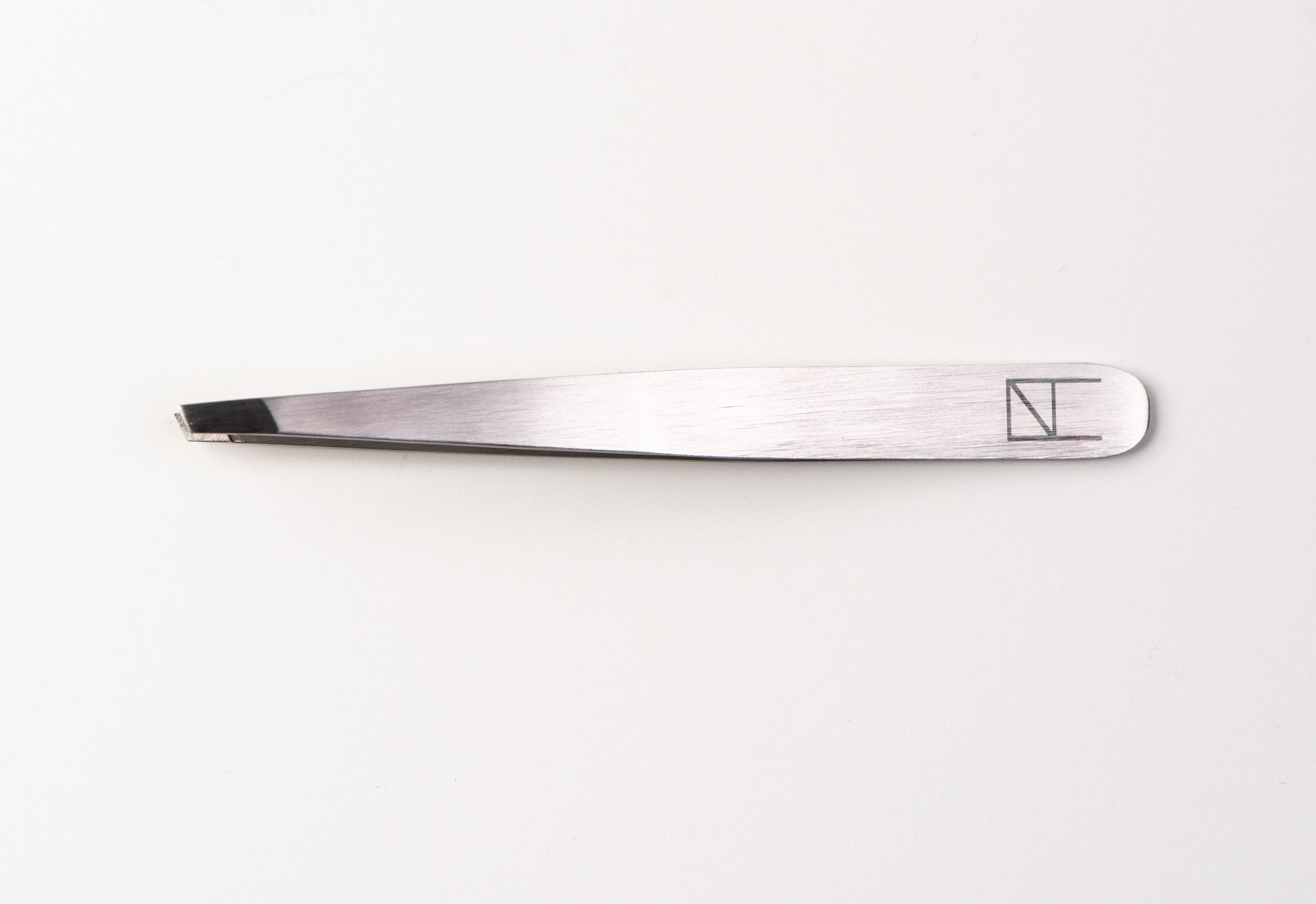 Classic Slanted/Pointed Tweezers by NATALLIA IVCHANKOVA - Panoply Beauty 
